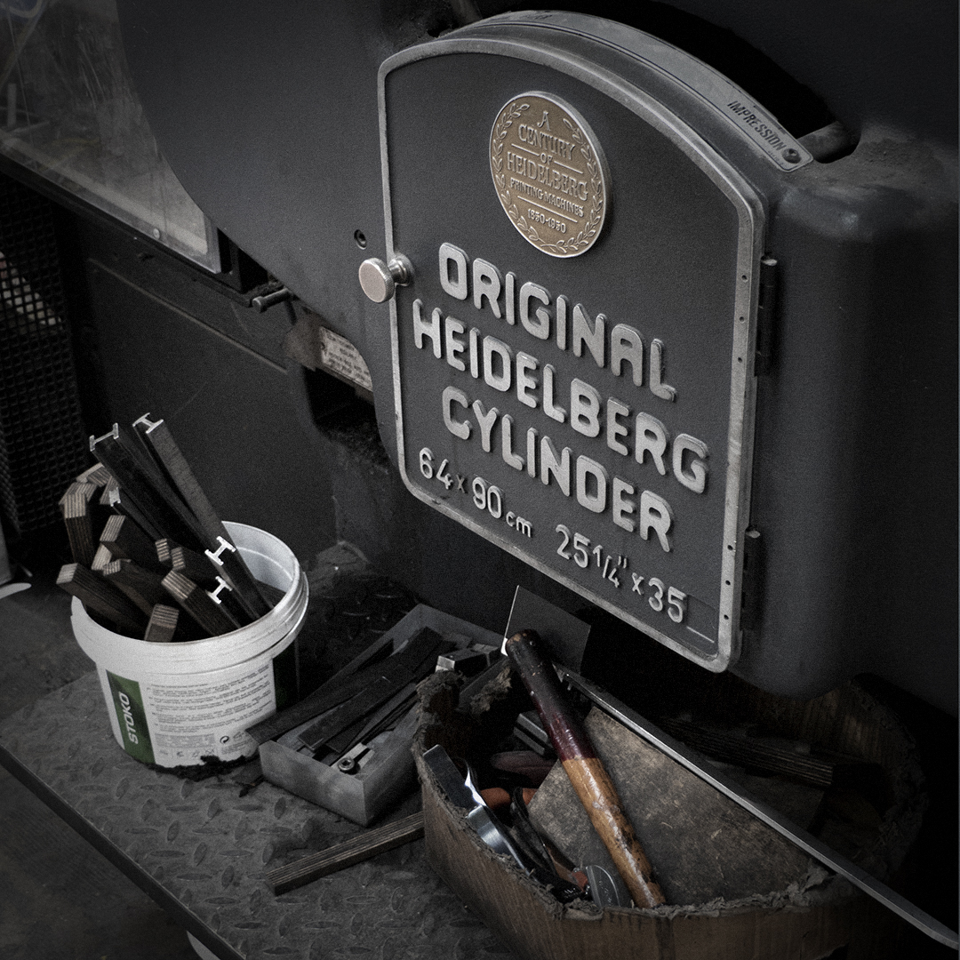 Original Heidelberg Cylinder printing press with traditional tools